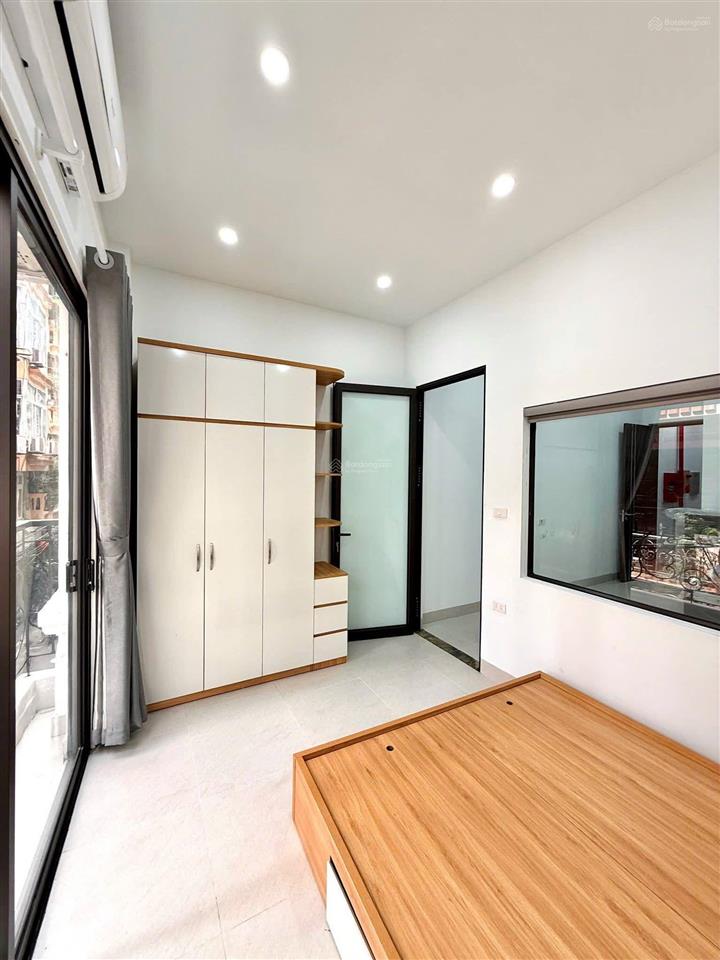 Bán tòa nhà căn hộ dòng tiền phố trần đại nghĩa  gần neu, lô góc 90m2, 7t thang máy, đủ gpxd pccc