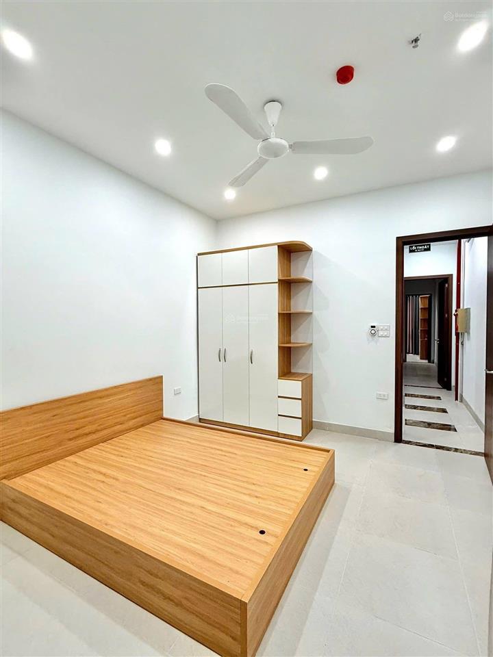Bán tòa nhà căn hộ dòng tiền phố trần đại nghĩa  gần neu, lô góc 90m2, 7t thang máy, đủ gpxd pccc