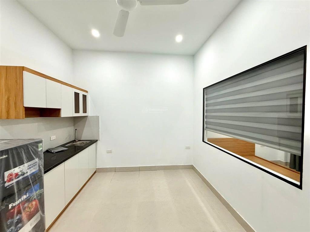 Bán tòa nhà căn hộ dòng tiền phố trần đại nghĩa  gần neu, lô góc 90m2, 7t thang máy, đủ gpxd pccc