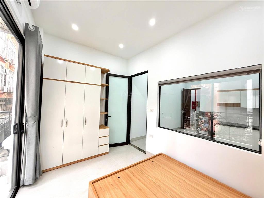 Bán tòa nhà căn hộ dòng tiền phố trần đại nghĩa  gần neu, lô góc 90m2, 7t thang máy, đủ gpxd pccc