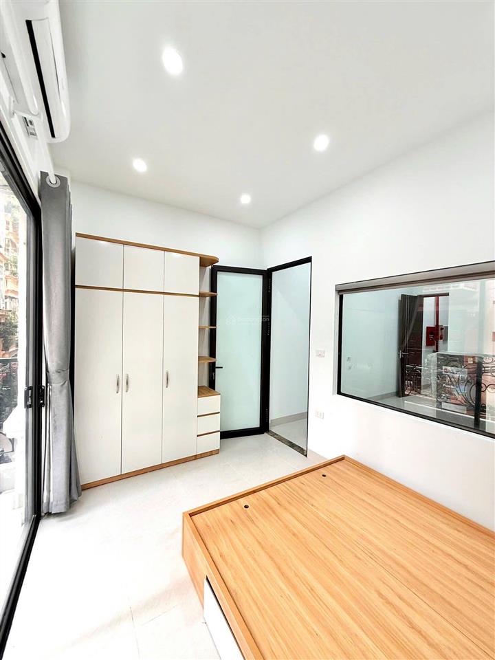 Bán tòa nhà căn hộ dòng tiền phố trần đại nghĩa  gần neu, lô góc 90m2, 7t thang máy, đủ gpxd pccc