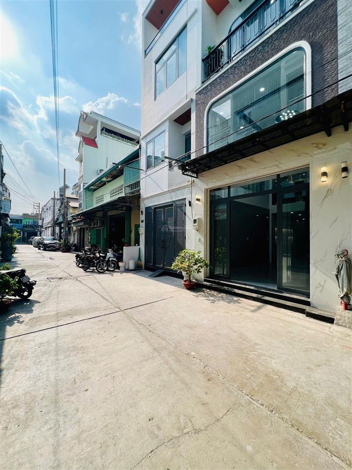 Bán nhà đường tân hòa đông (nhà 6 tấm 4m*15m thang máy 450kg giá 8ty6 tl) hẻm 7m gần chợ phú lâm