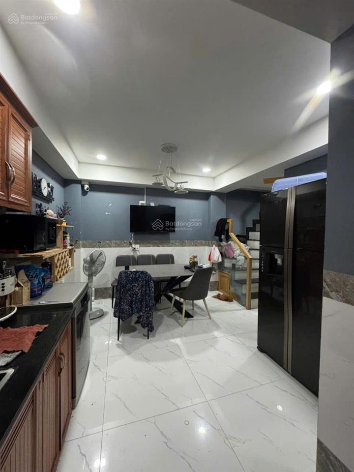 Nhà 1 hầm 1 trệt 1 lửng 3 lầu tại phan văn trị, bình thạnh  dt 58m2  giá 9,8 tỷ.