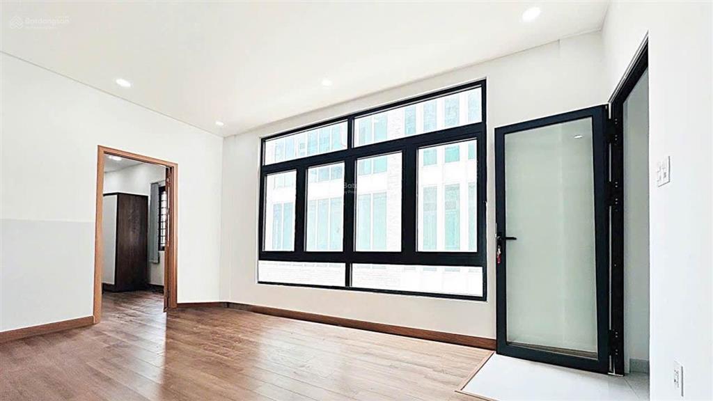Mặt tiền góc đỗ xuân hợp  nhà mới 11 phòng lớn có thang máy 850m2 sàn