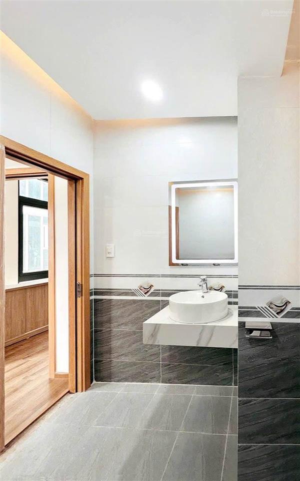 Mặt tiền góc đỗ xuân hợp  nhà mới 11 phòng lớn có thang máy 850m2 sàn