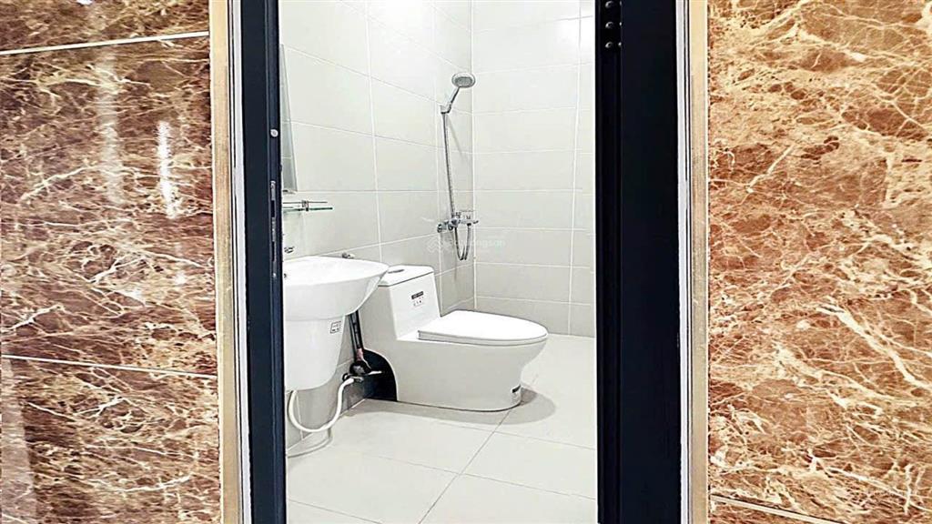 Mặt tiền góc đỗ xuân hợp  nhà mới 11 phòng lớn có thang máy 850m2 sàn
