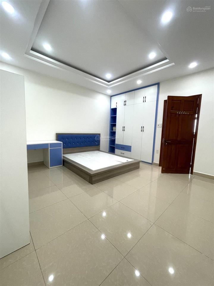 Nhà quốc lộ 13 hiệp bình phước 4 tầng  8 tỷ 2  hẻm xe hơi