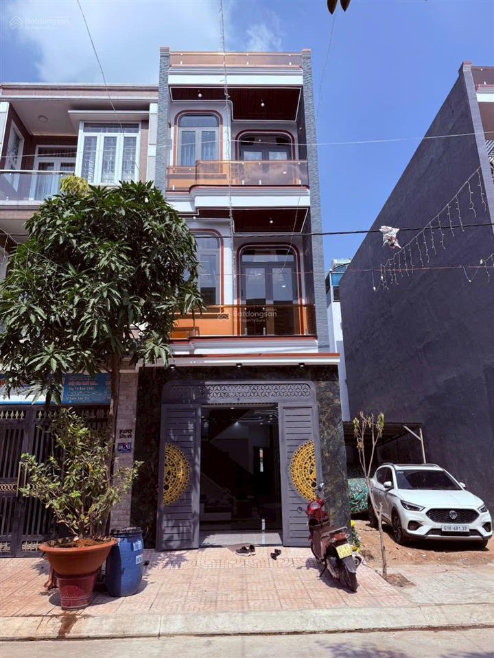 Bán nhà trệt 2 lầu dt 60m ngang 4 tc 100% gần trung tâm y tế dĩ an giá 5ty5  0906 309 ***gc