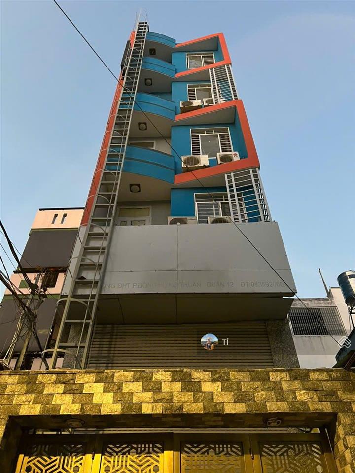 Bán chdv 24 phòng mt dht39 sát mt trường chinh cầu tham lương 4x26m trệt 6 lầu giá 12.5 tỷ kề kcn