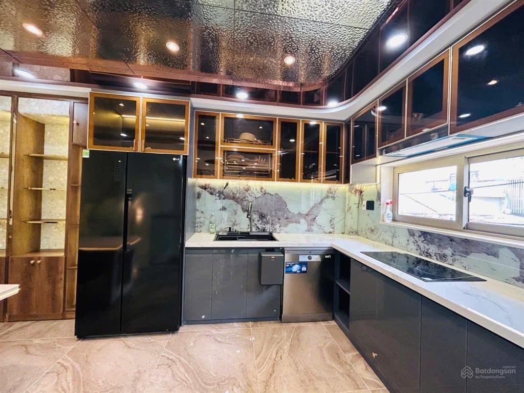Thiếu oxy lỗ 1 tỷnhà 6m x 8m 4 lầugaraxe 7 chỗhẻm 6m phan huy ích
