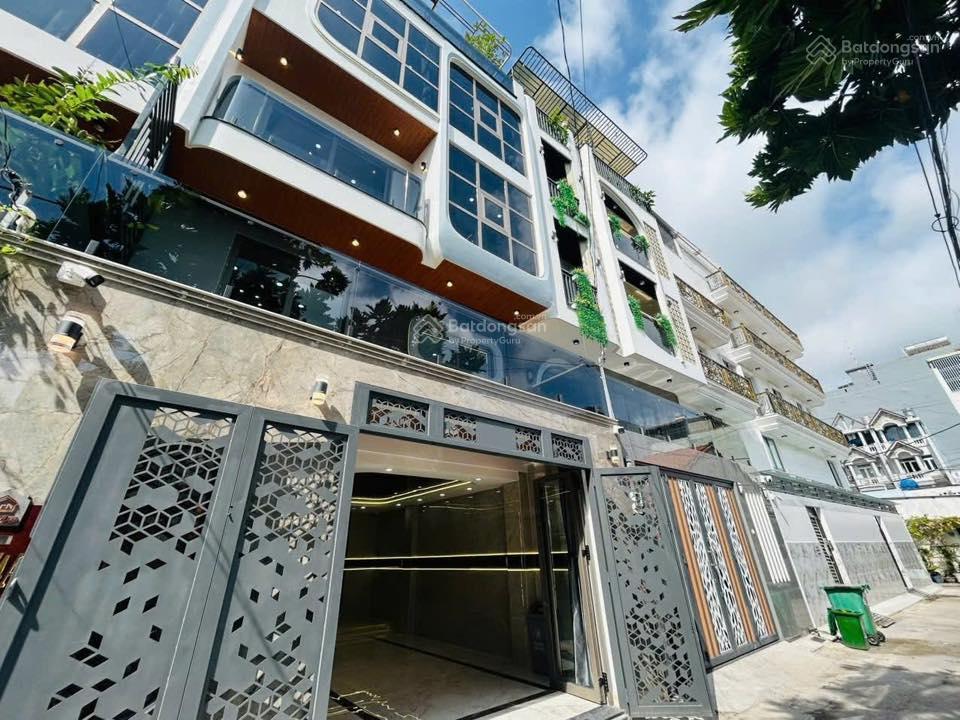 Thiếu oxy lỗ 1 tỷnhà 6m x 8m 4 lầugaraxe 7 chỗhẻm 6m phan huy ích