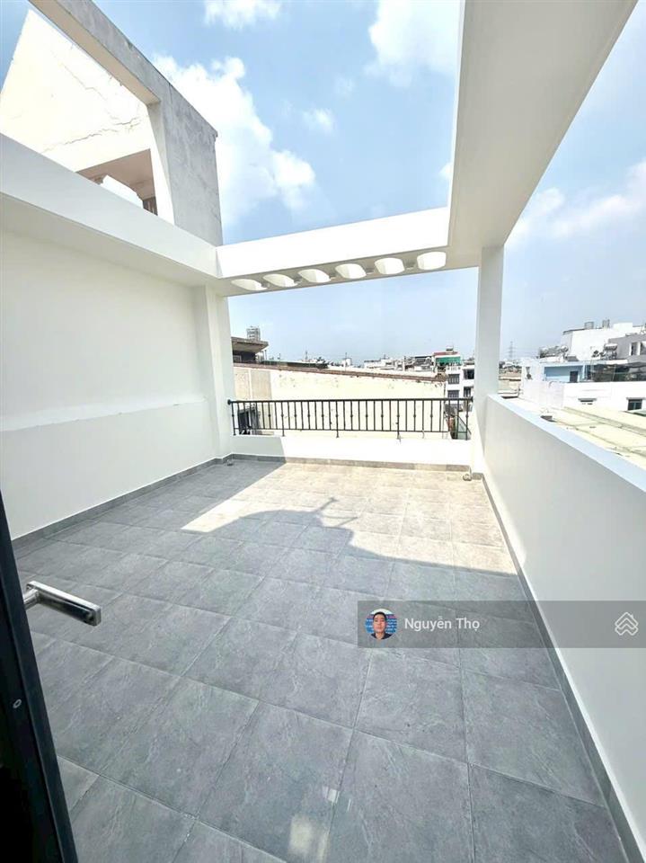 Bán nhà dt 4 x 14m, 1 trệt 2 lầu sân thượng. hẻm 5m thông ra kênh tham lương