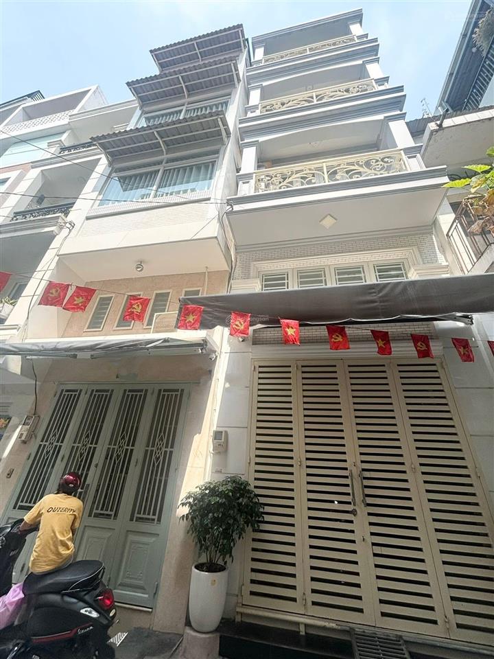 Bán nhà 5 tầng mặt tiền vĩnh khánh giáp bến vân đồn