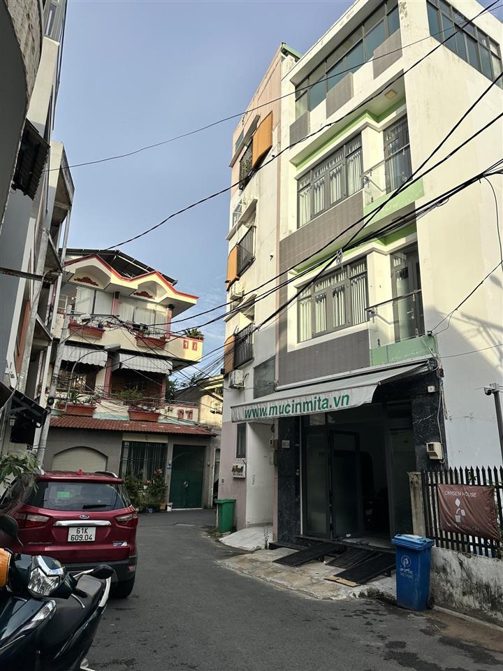 Nhà hẻm xe hơi quận 7  4 tầng đường nhựa chỉ 10,5 tỷ. ngay lotte