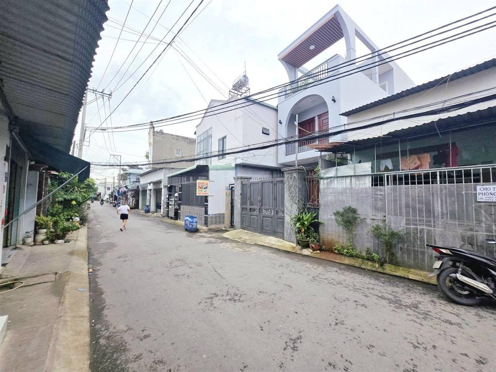 317m2. ngang 10m. nhà 2 tầng + 1 kiot + 13 p.trọ. xe hơi tránh linh xuân. thủ đức
