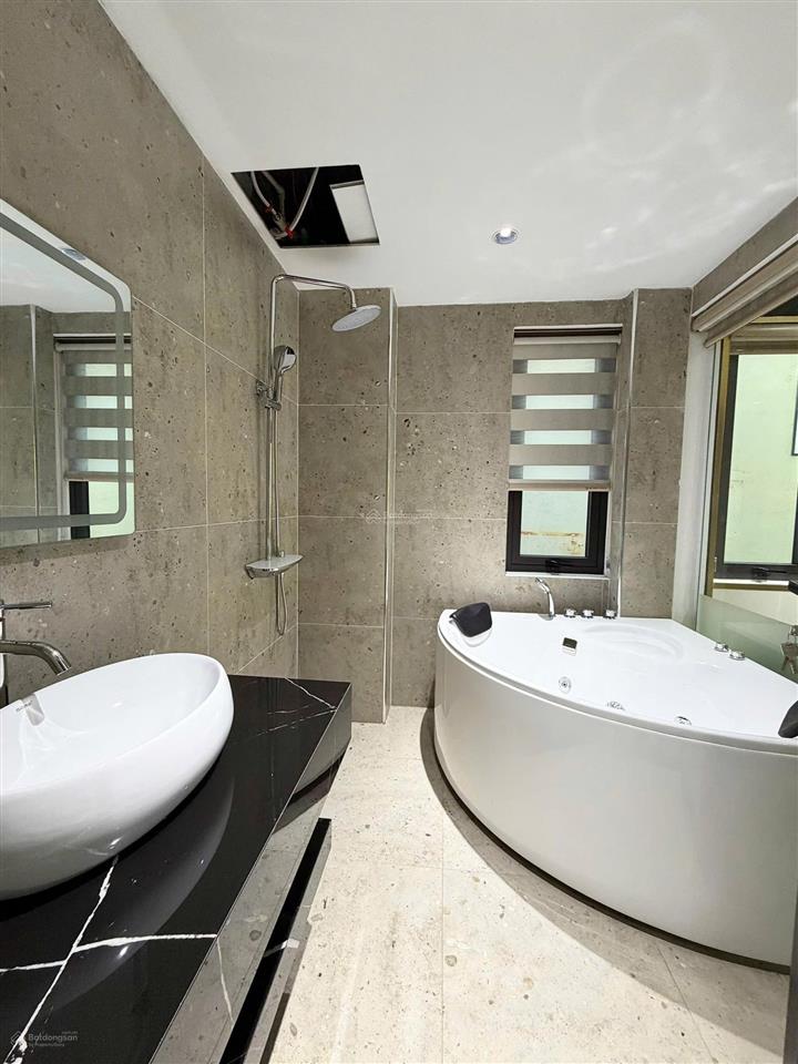 Bán nhà phân lô nguyễn sơn  hoàng minh đạo 70m2 mt7m 7 tầng thang máy ô tô tránh 3 thoáng full nt
