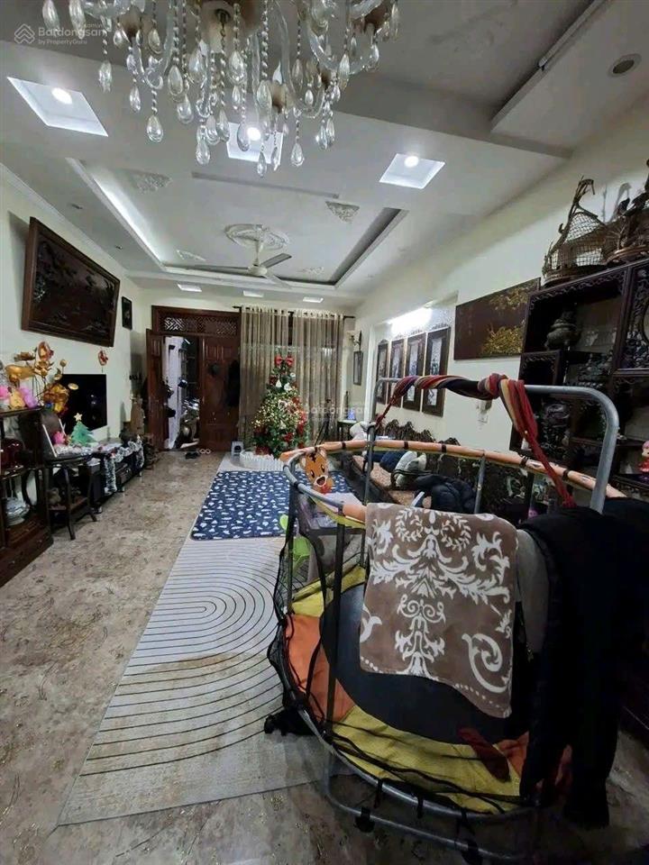 Bán nhà phố hào nam đống đa 38 tỷ 100m2 mt 5m 5 tầng ô tô tránh kinh doanh sát phố.