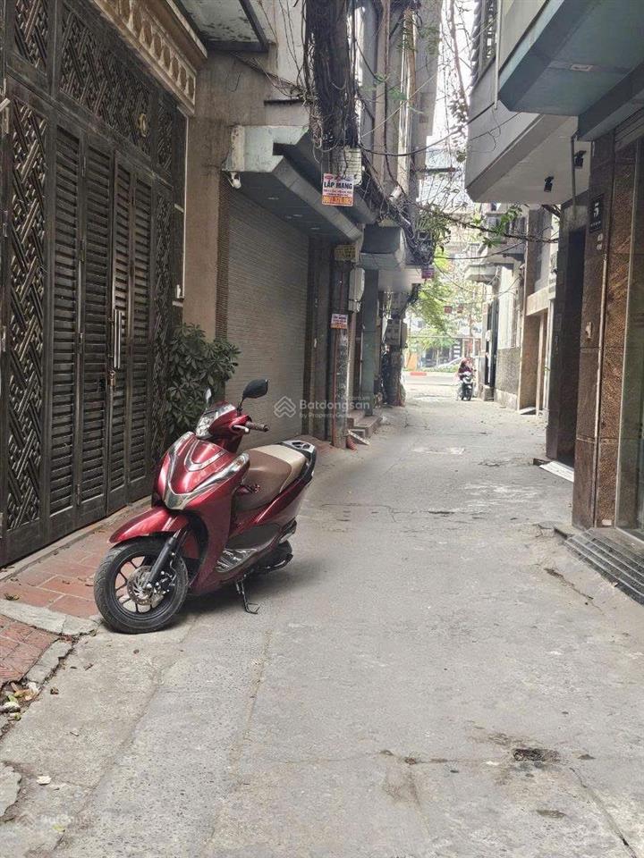 Bán nhà phố hào nam đống đa 38 tỷ 100m2 mt 5m 5 tầng ô tô tránh kinh doanh sát phố.