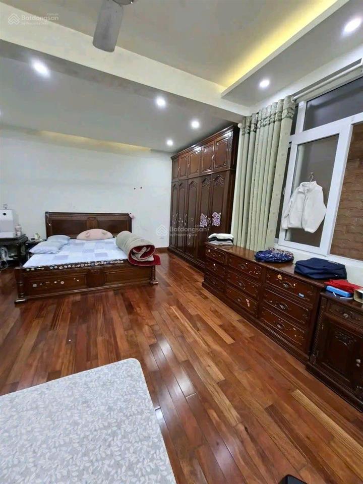 Bán nhà phố hào nam đống đa 38 tỷ 100m2 mt 5m 5 tầng ô tô tránh kinh doanh sát phố.