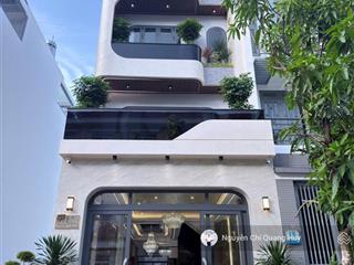 Nhà phố xây dựng mới khu dân cư cao cấp văn minh  đường rộng 14m có thang máy5m x 18m giá 18,9 tỷ
