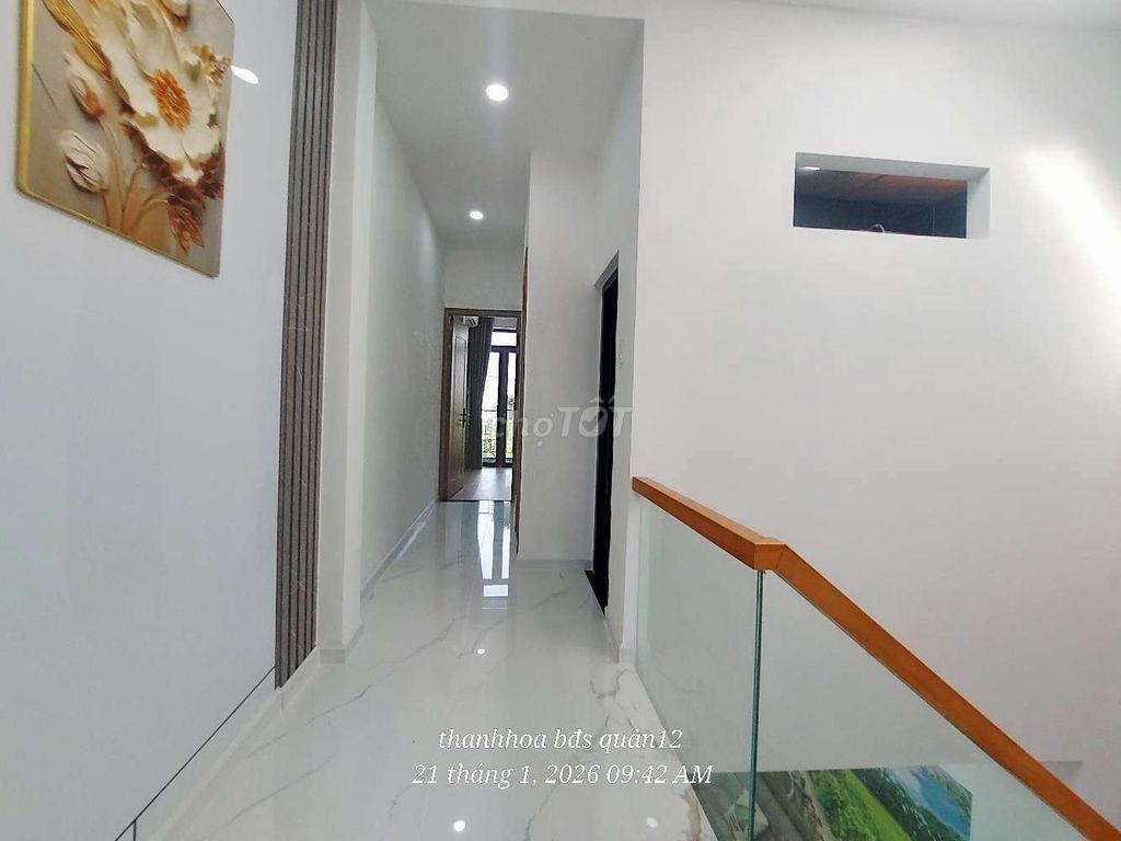 Nhà phố xây mới , 3 phòng ngủ , đường tx 52 vào 200 m