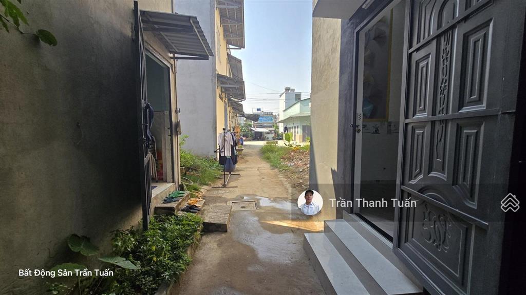 Kdc xuyên á ngay chân cầu lớn hóc môn, nhà mặt tiền đường nhựa 14m, sổ hồng riêng, rẻ nhất khu