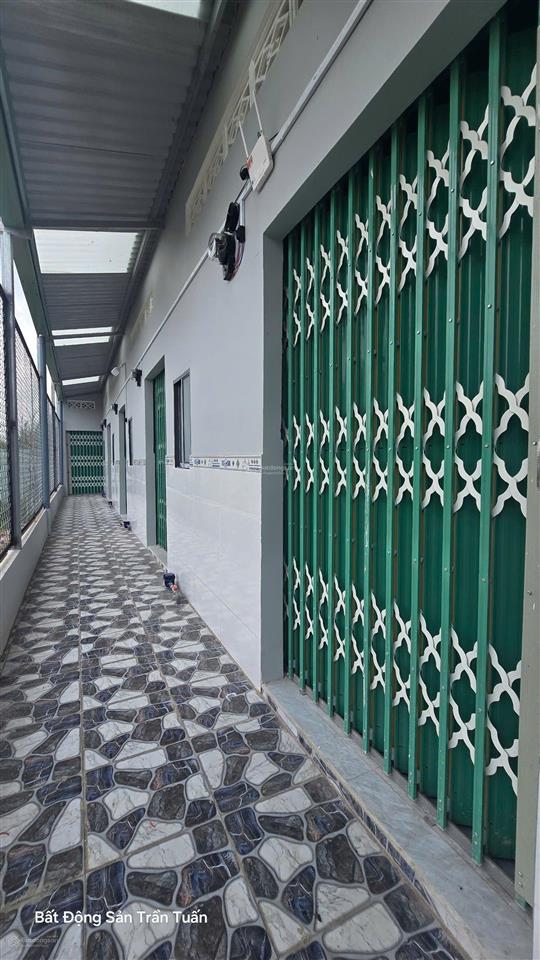 Dãy trọ 5x25m gồm 1 căn lầu và 5 phòng trọ, thu nhập 12tr7/tháng. còn mới, chỉ việc thu tiền