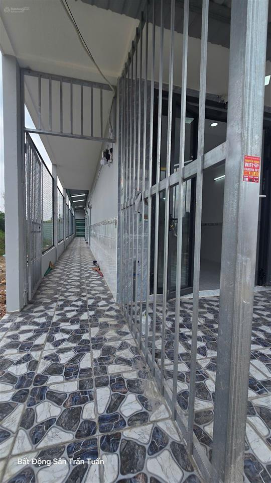 Dãy trọ 5x25m gồm 1 căn lầu và 5 phòng trọ, thu nhập 12tr7/tháng. còn mới, chỉ việc thu tiền