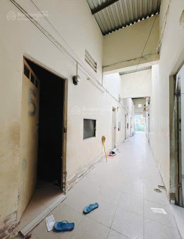 Cần tiền bán lỗ miếng đất sẳn nhà trọ cho thuê 10 phòng