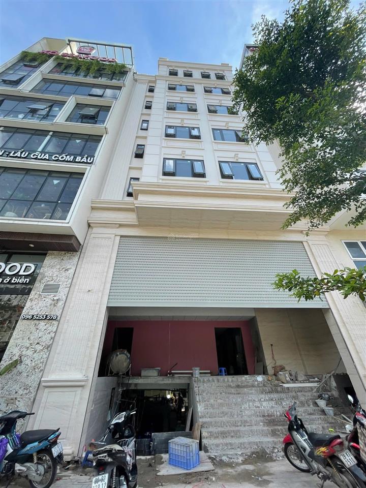 Bql cho thuê toà nhà văn phòng 8 tầng nổi + 1 hầm, đường ô chợ dừa. diện tích 200m2 giá 200k/m2/th