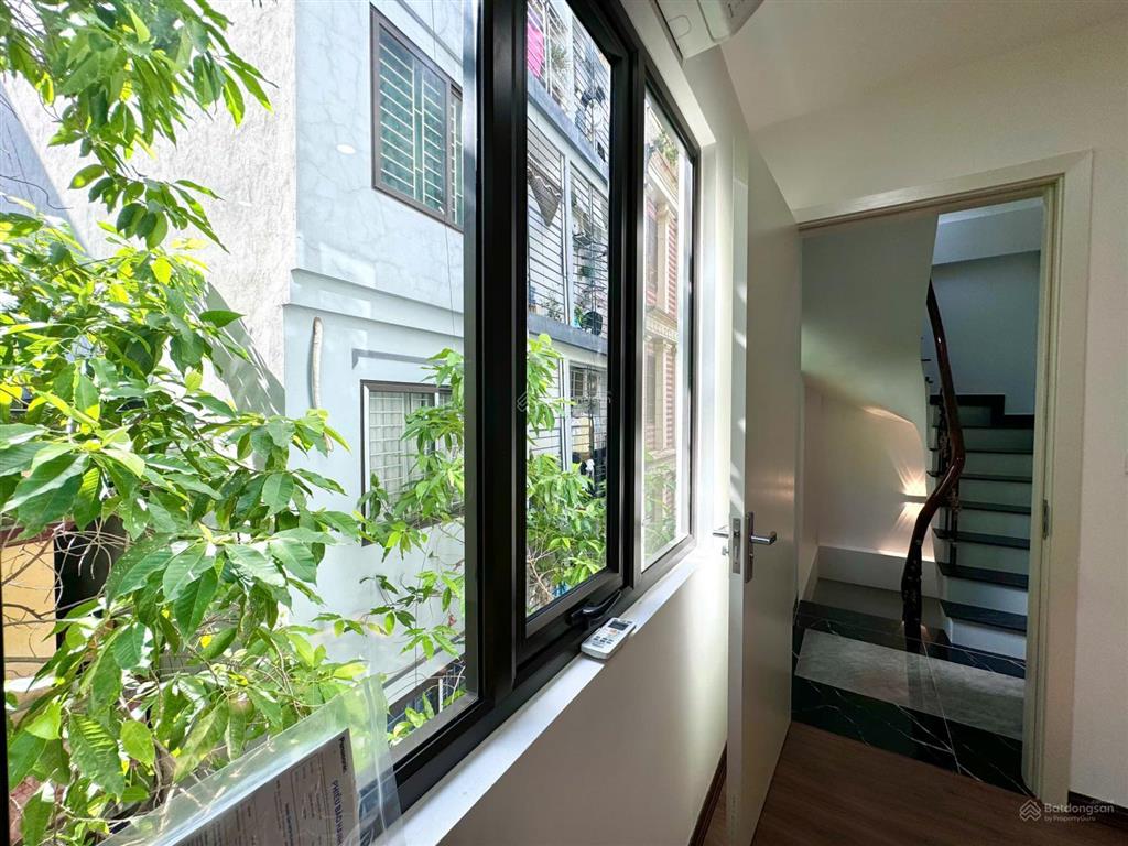 Hiếm! nhà cực đẹp 38m2x7t thang máy. cách phố 50m, vuông vắn  ngõ rộng thoáng phố trần thái tông.