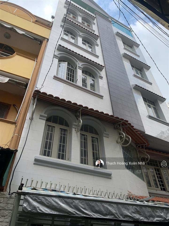 Nhà ngang đẹp 7m + 15 phòng chdv nguyễn văn trỗi, pn  7 x 10m  6 tầng  tn 60 tr/th  chỉ 13 tỷ
