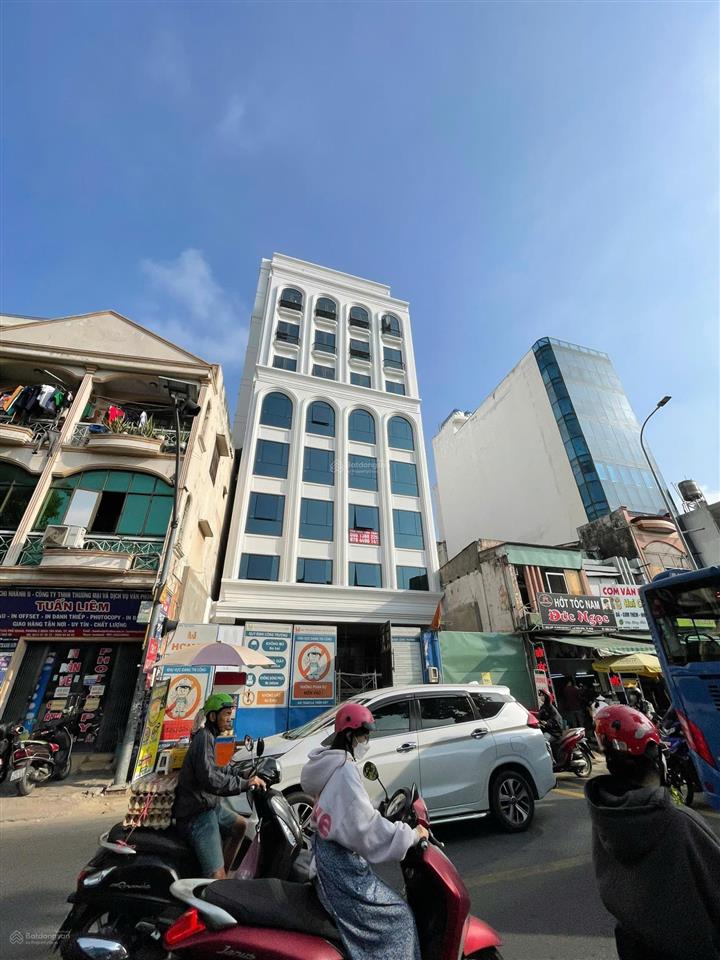 Bán tòa nhà mt phổ quang p2 tb, dt 11.6x31m cn 377m2, kc 2 hầm 10 tầng, giá 225 tỷ