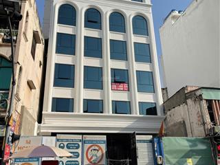 Bán tòa nhà mt phổ quang p2 tb, dt 11.6x31m cn 377m2, kc 2 hầm 10 tầng, giá 225 tỷ