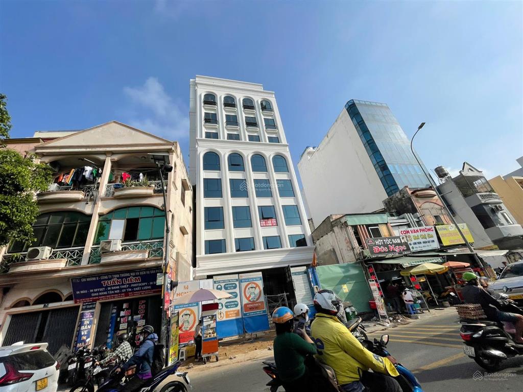 Bán tòa nhà mt phổ quang p2 tb, dt 11.6x31m cn 377m2, kc 2 hầm 10 tầng, giá 225 tỷ