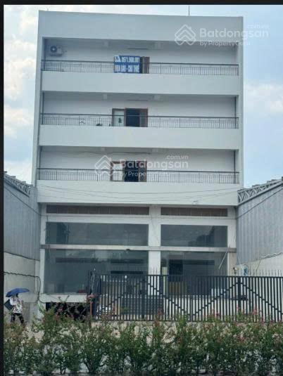 Hạ giá bán toà nhà mt lê văn việt. q9  12x47m, cn 563,9m2  hầm + 7 lầu  hđt 250tr/th  125 tỷ