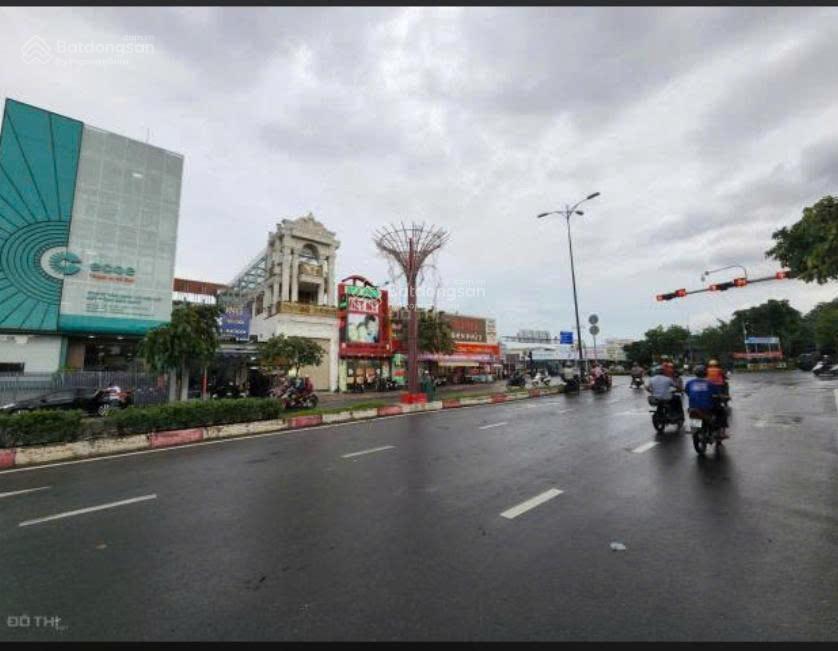Hạ giá bán toà nhà mt lê văn việt. q9  12x47m, cn 563,9m2  hầm + 7 lầu  hđt 250tr/th  125 tỷ