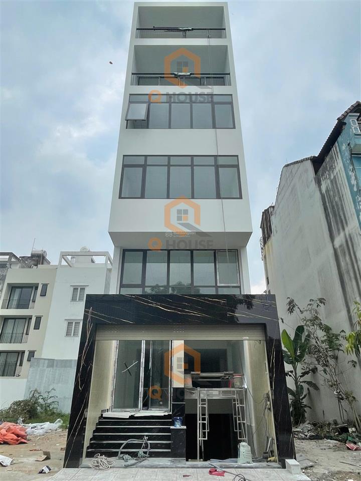 Tòa nhà "mới" trương văn bang 5*20m, hầm trệt, lửng, 2 lầu suốt, thang máy, 60 triệu/tháng