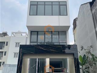 Tòa nhà "mới" trương văn bang 5*20m, hầm trệt, lửng, 2 lầu suốt, thang máy, 60 triệu/tháng