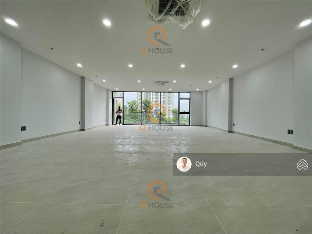 Tòa nhà "mới" 1000m2 ngay trương văn bang thạnh mỹ lợi, hầm 7 tầng suốt thang máy, 150 triệu/tháng