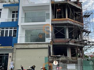 Tòa nhà "mới" an phú  an khánh 5m*20m, hầm, 4 tầng suốt, thang máy, chỉ 65 triệu/tháng
