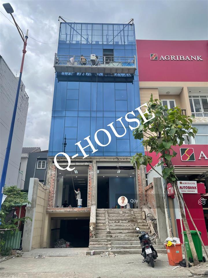 Tòa nhà mặt tiền lương định của p. an phú 7m*19m, hầm, 4 lầu rộng rãi, thang máy, 100 triệu/tháng