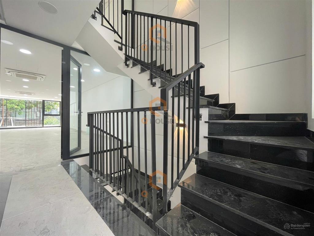 Tòa nhà "mới" an phú an khánh gần lương đình của 5*20m, hầm, 4 tầng suốt, thang máy, 80 triệu/tháng