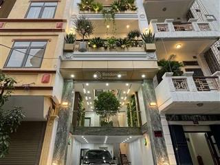 Bán nhà mới thang máy gara ô tô phố trần quốc vượng