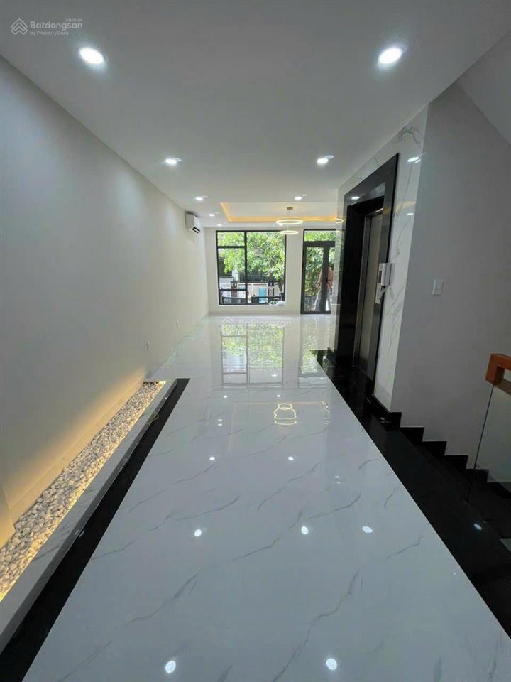 Cho thuê rẻ 45tr/th nhà 5x20m2 himlam có thang máy, tk văn phòng  0908 935 ***