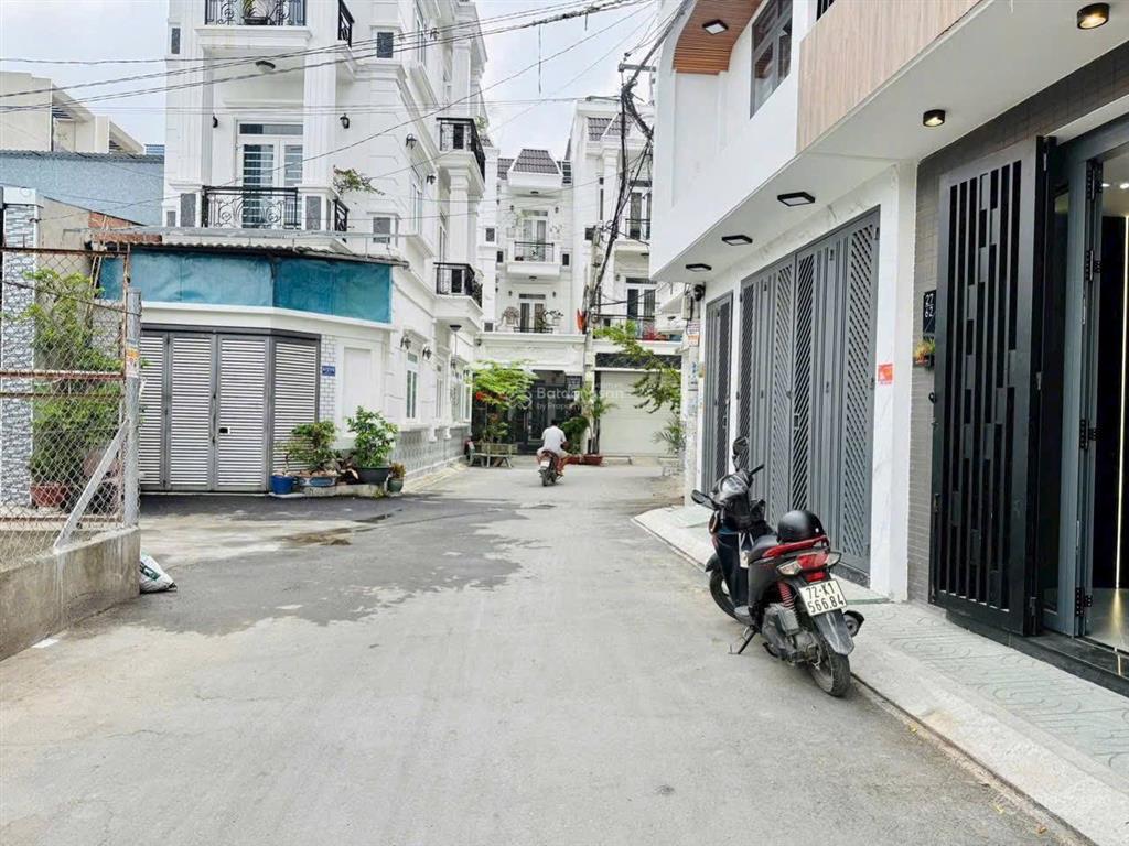 Nhà mới xây tx33 trệt lửng 3 lầu 4x15 hẻm thông ô tô