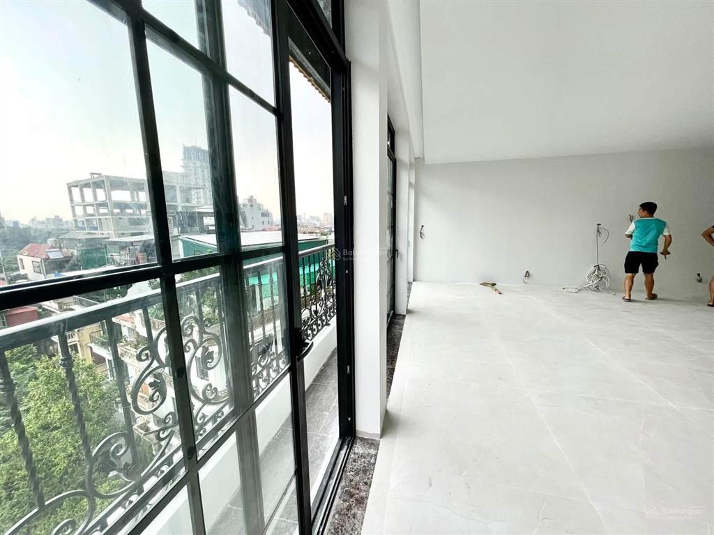 Chỉ hơn 30 tỷ.toà nhà thang máy,vạn phúc đội cấn lô góc 2 mặt ngõ thông ô tô tránh,kinh doanh tốt