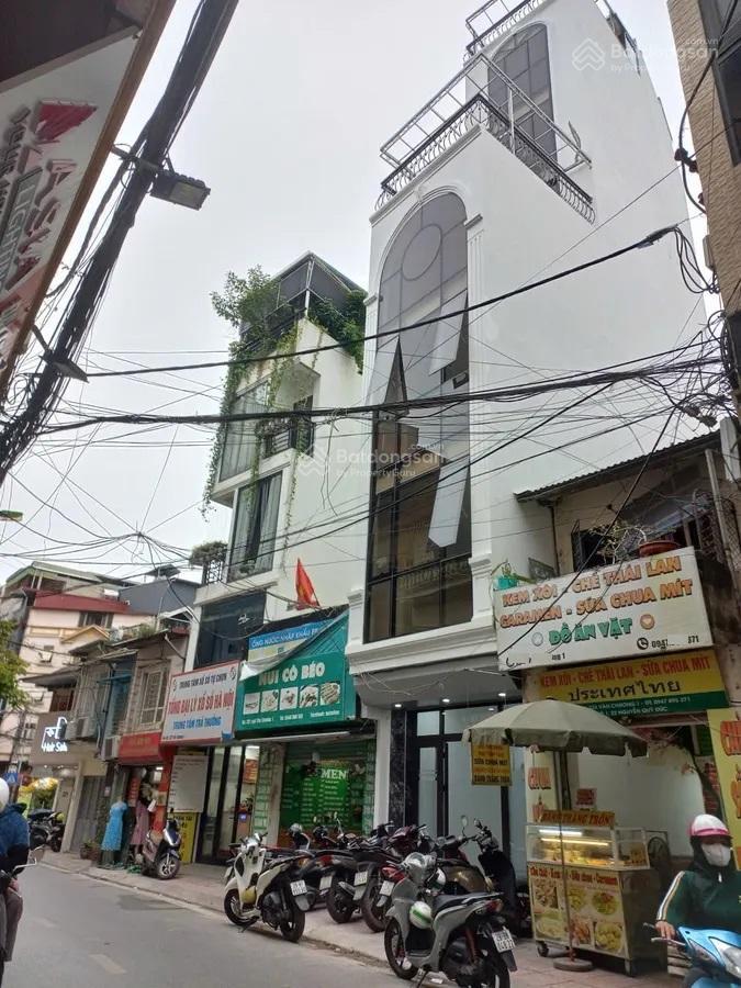 Hạ chào bán gâp nhà phố khâm thiên  đống đa, 85m2  8 tầng thang máy vỉa hè ô tô tránh chỉ 21 tỷ