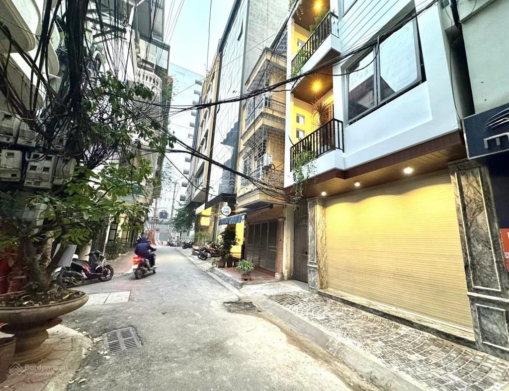 Bán nhà thái hà  đống đa 60m 6 tầng lô góc ô tô tránh vỉa hè giá 30 tỷ