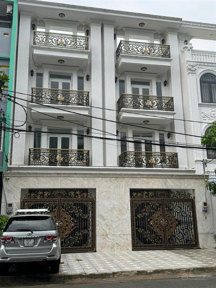 Tòa nhà mtkd cạnh công viên bình phú  10x20m 5 tầng thang máy